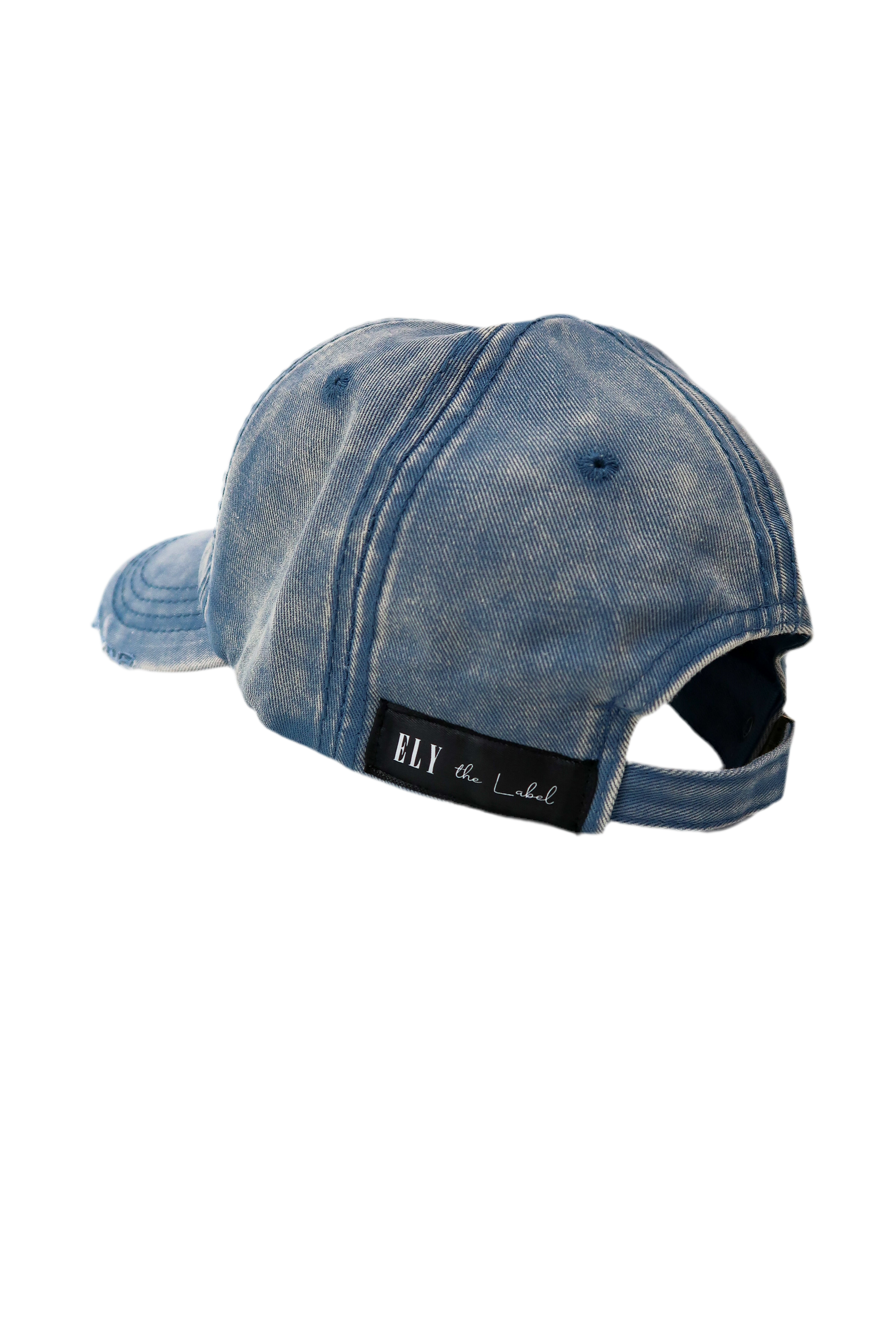 𝐄𝐋𝐘𝐬𝐩𝐨𝐫𝐭 𝘩𝘢𝘵 in distressed denims – ELY the label