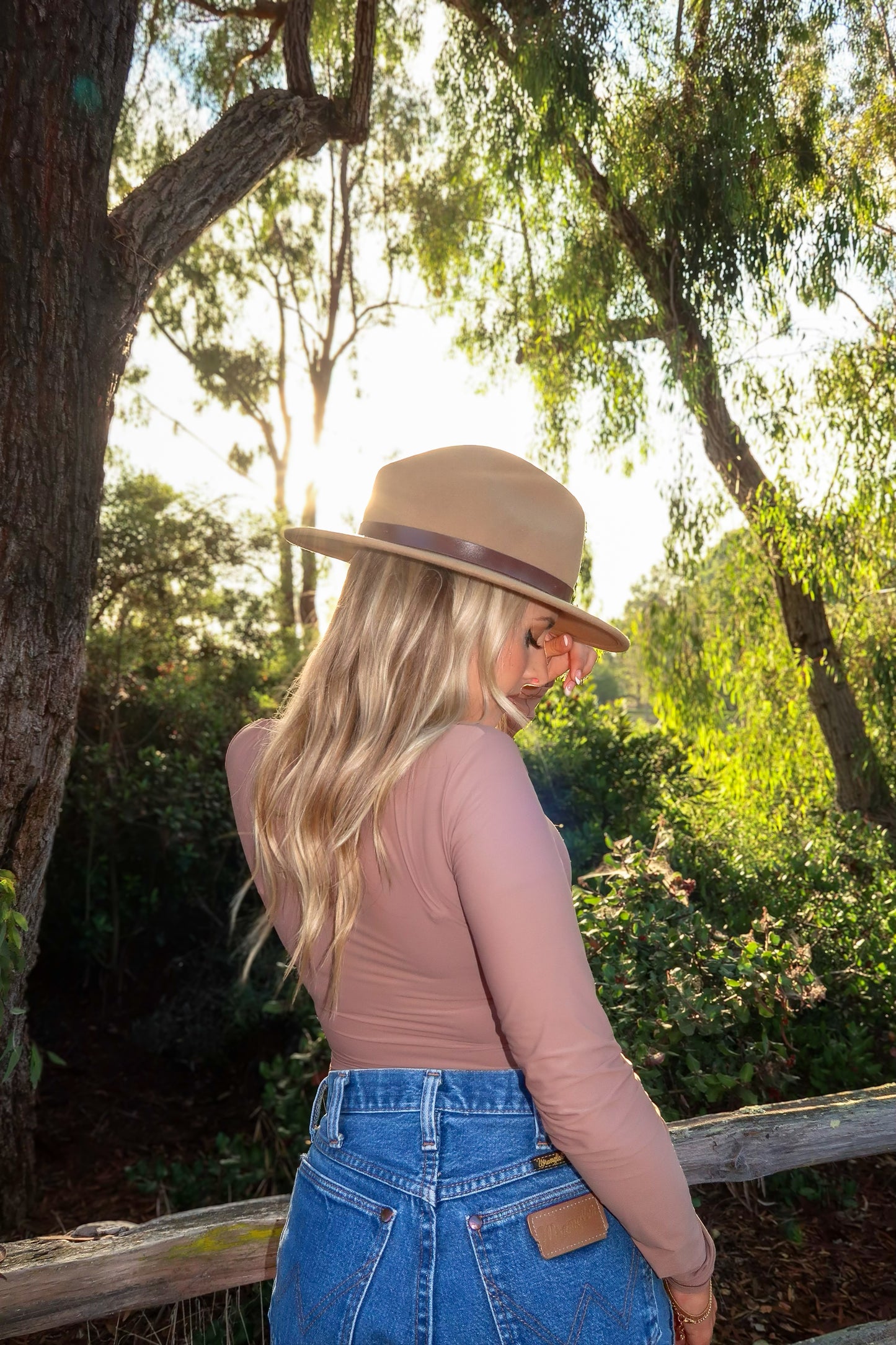 buttery soft thin long sleeve crew neck bodysuit for women to shape curves on model Taylor