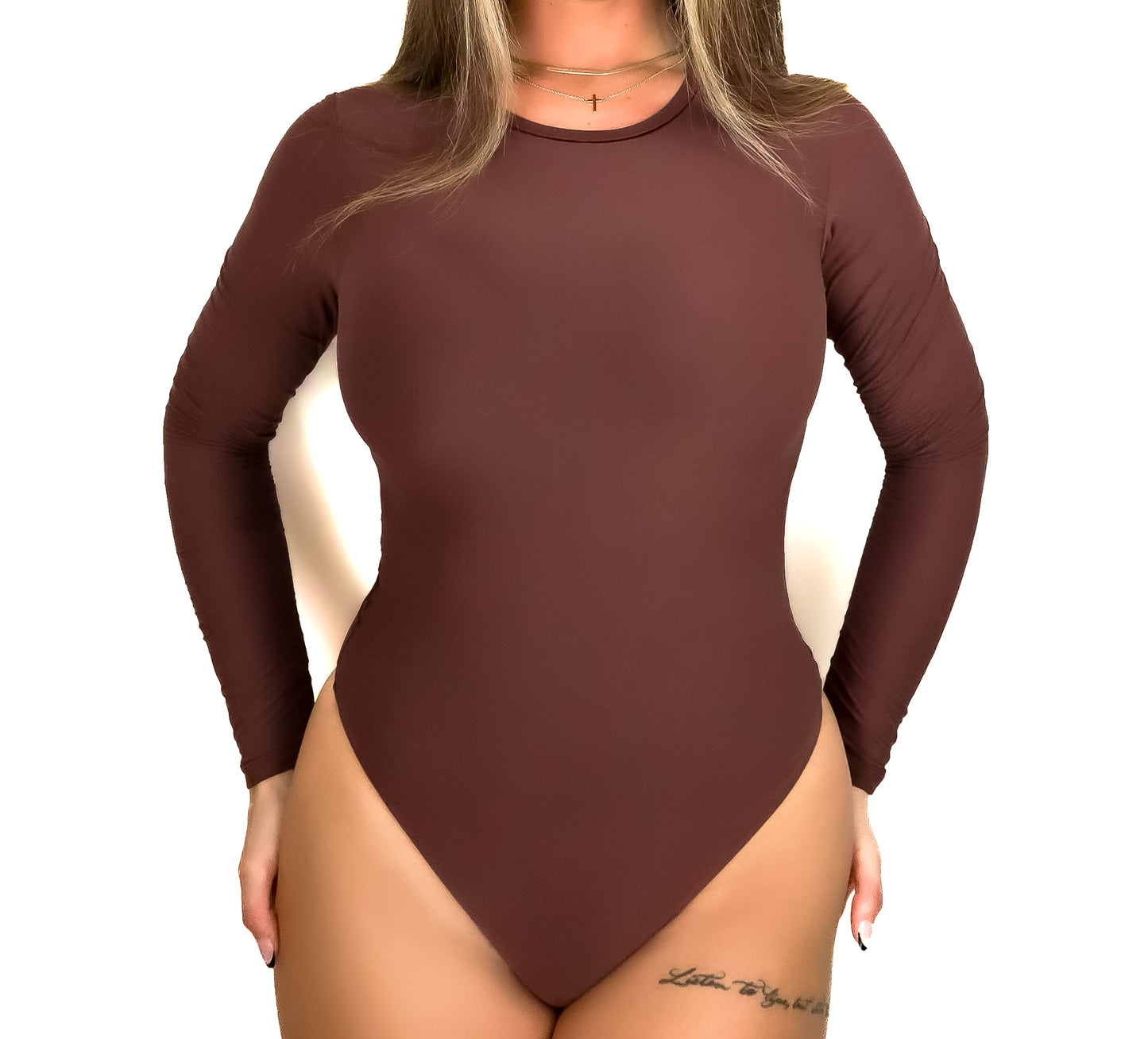 buttery soft thin long sleeve crew neck bodysuit for women to shape curves on model Eileen Hayman